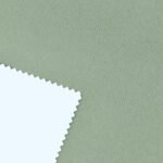 Tela blackout vinílico color verde malva, ideal para bloquear la luz en espacios interiores.