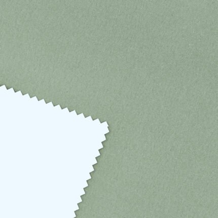 Tela blackout vinílico color verde malva, ideal para bloquear la luz en espacios interiores.