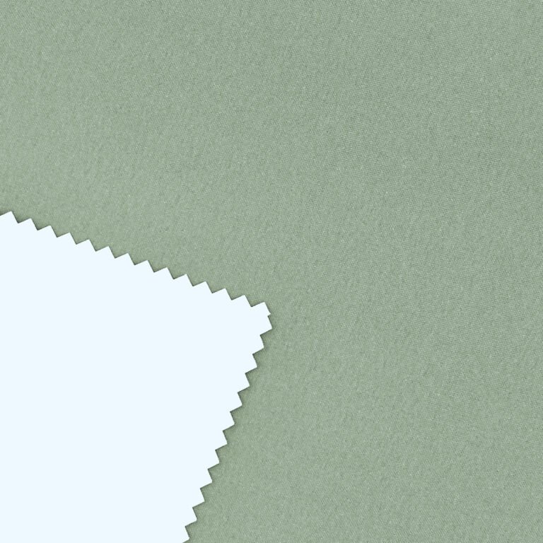 Tela blackout vinílico color verde malva, ideal para bloquear la luz en espacios interiores.